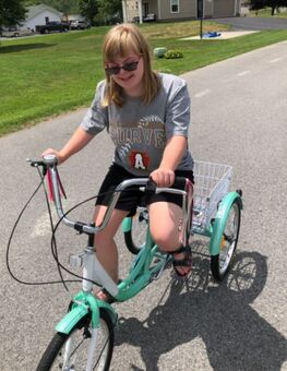 Addison riding her bike